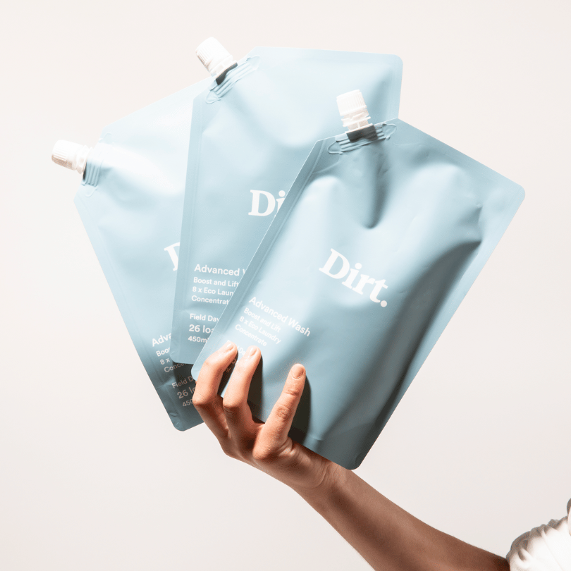 Dirt advanced wash refill bundle held in hand