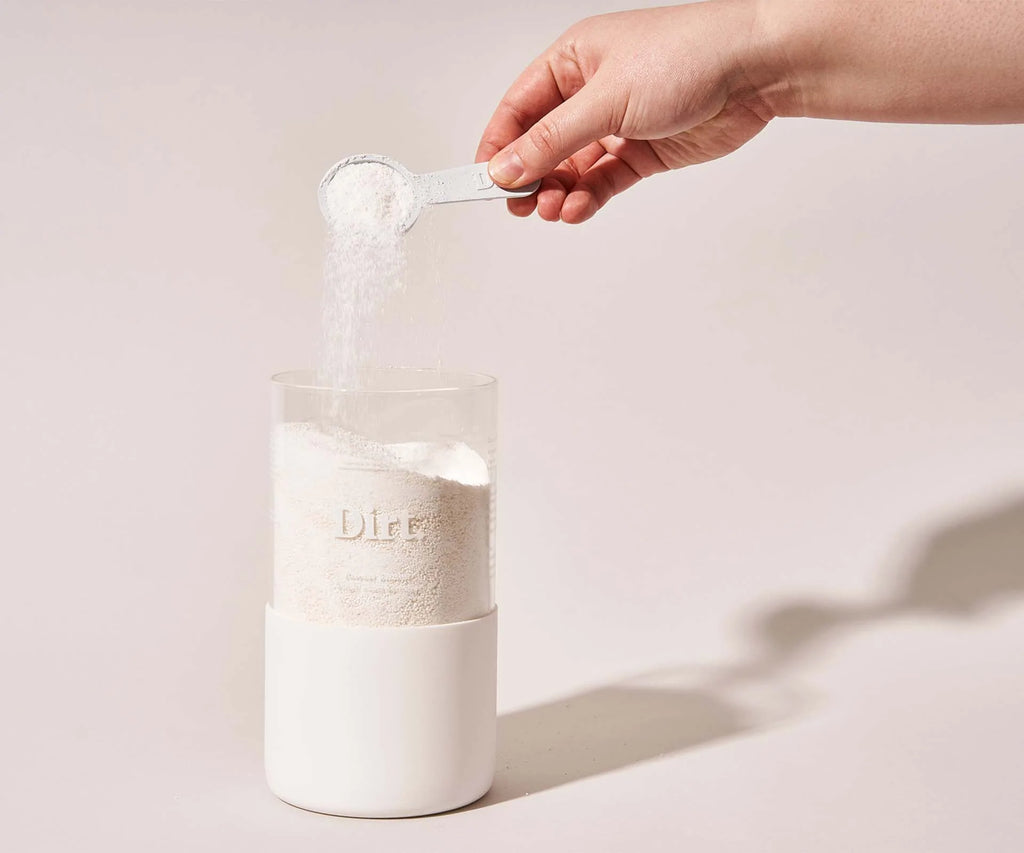 Dirt booster powder jar and recycled plastic scoop